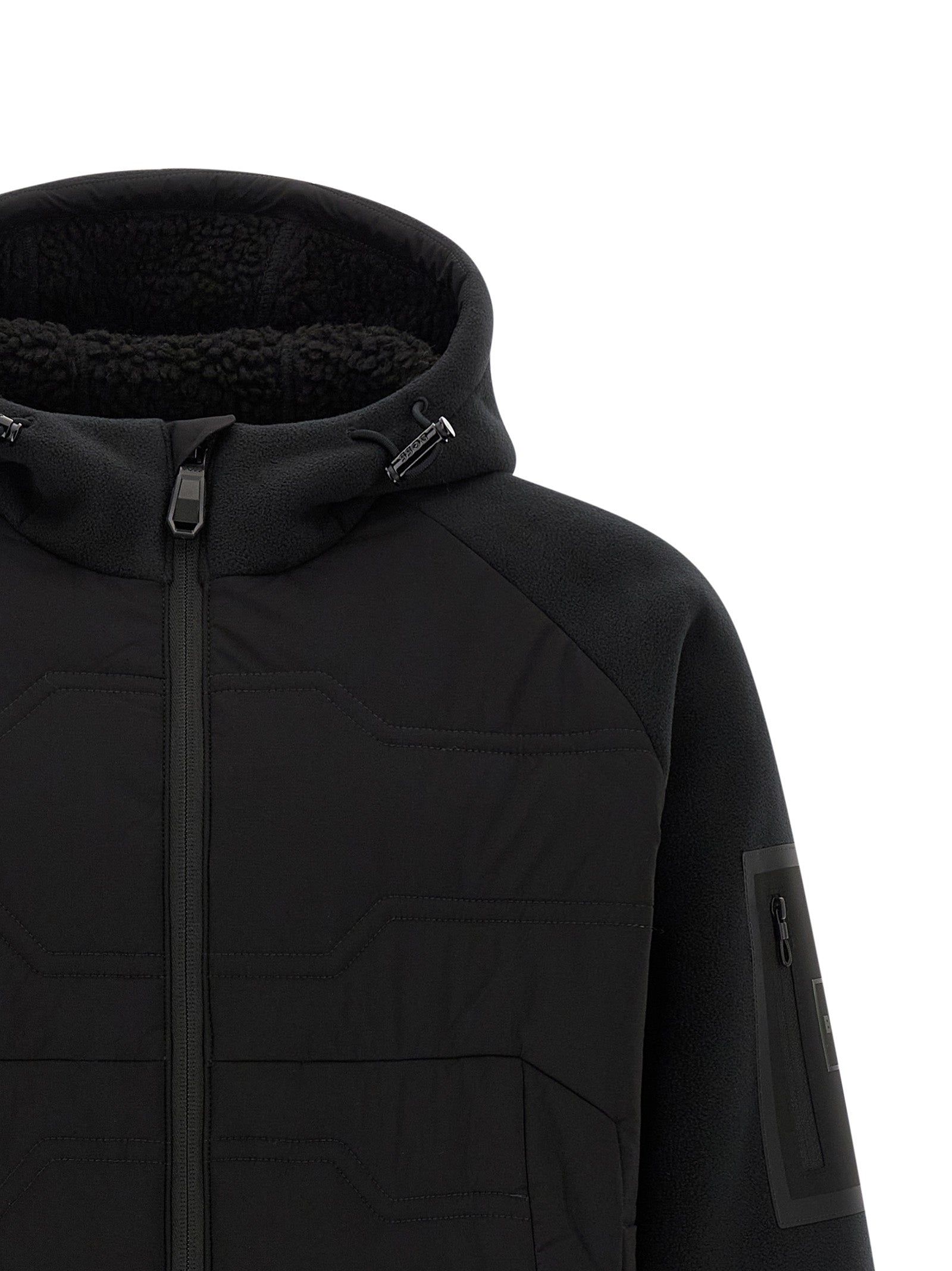 Veste en polyester noire de Hugo Boss, coque extérieure légère et résistante, style moderne et élégant.
