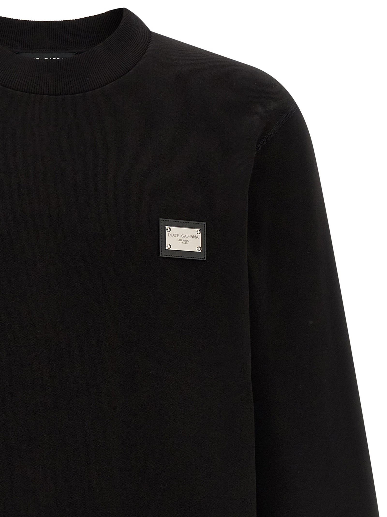 Sweat-shirt en coton noir de Dolce & Gabbana, style décontracté avec logo de la marque visible sur la poitrine.