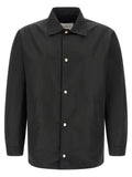 Veste en polyester noire Givenchy pour femme, détail de la coupe élégante et du tissu texturé.
