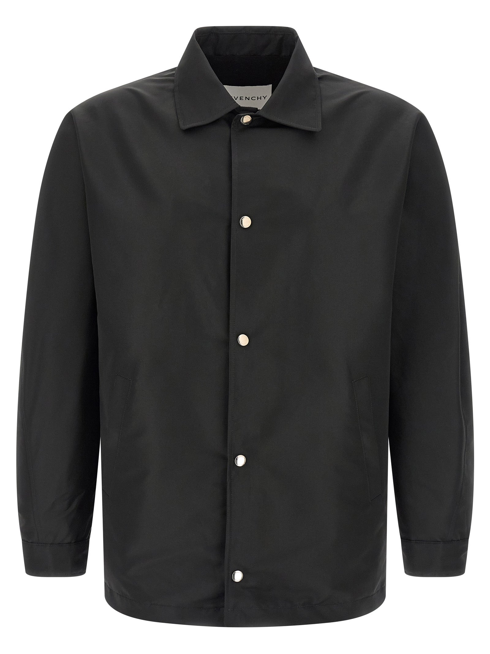 Veste en polyester noire Givenchy pour femme, détail de la coupe élégante et du tissu texturé.