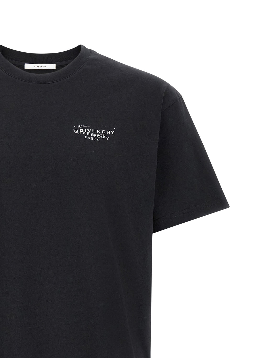 T-shirt noir en coton Givenchy, coupe classique avec logo discret, porté sur un mannequin.