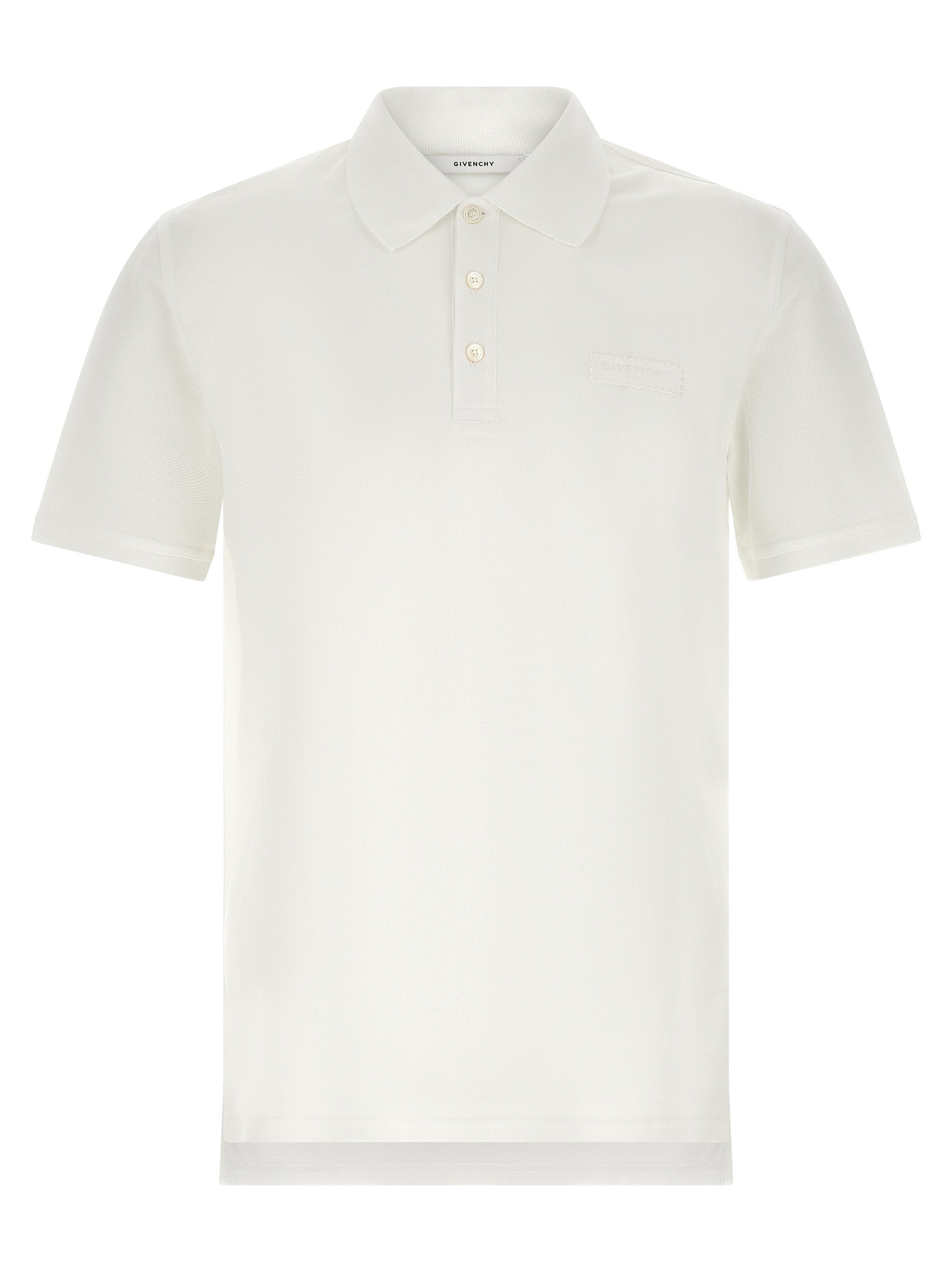 Chemise polo Givenchy blanche en coton avec col et boutons visibles, élégante et classique, sur un fond neutre.