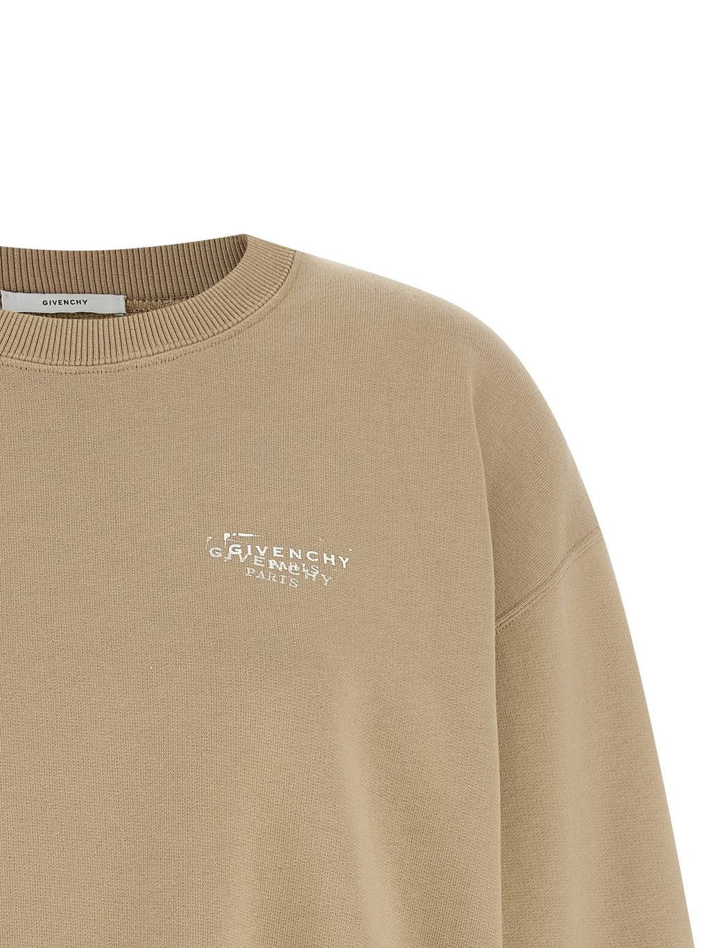 Sweat-shirt beige en coton de la marque Givenchy, avec détails de style décontracté et logo discret visible sur l'image.