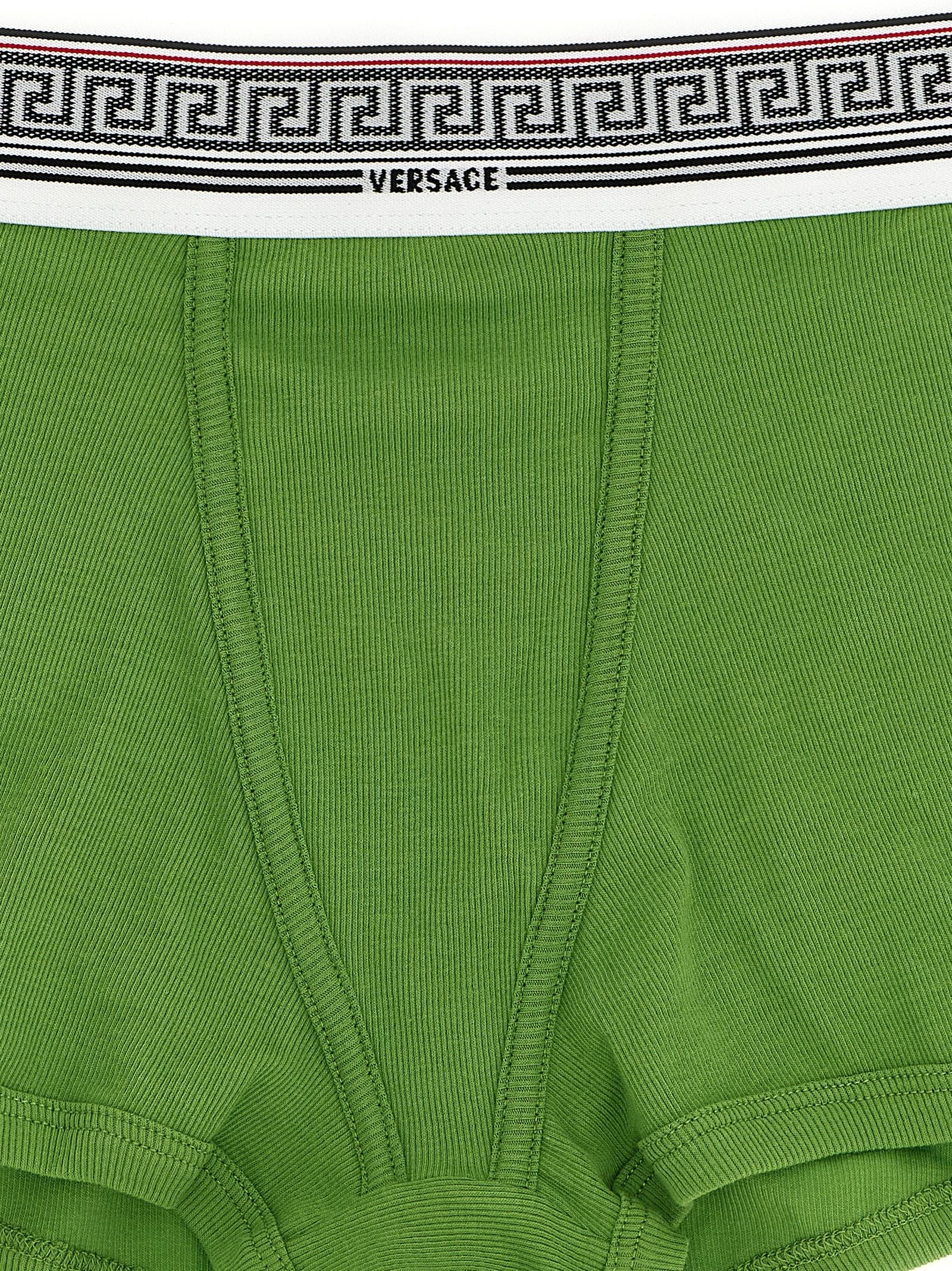 Culotte bicolore en coton de la marque Versace, avec logo distinctif et design élégant, vue sur le produit.