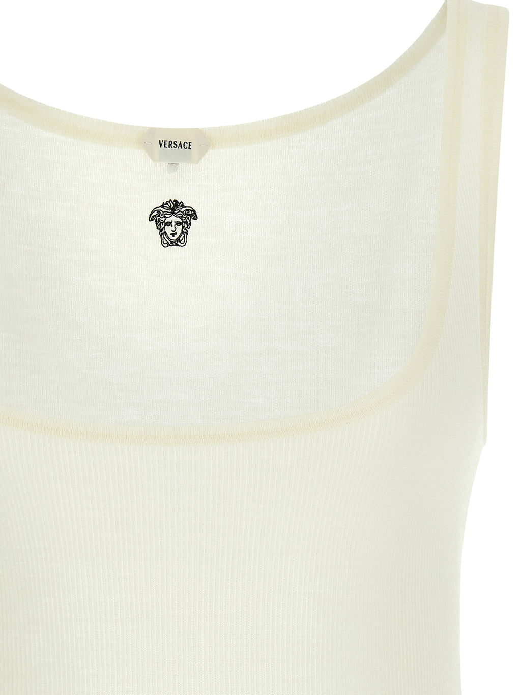 T-shirt sans manches en laine vierge blanche de Versace, élégant et moderne, affichant le logo emblématique de la marque.