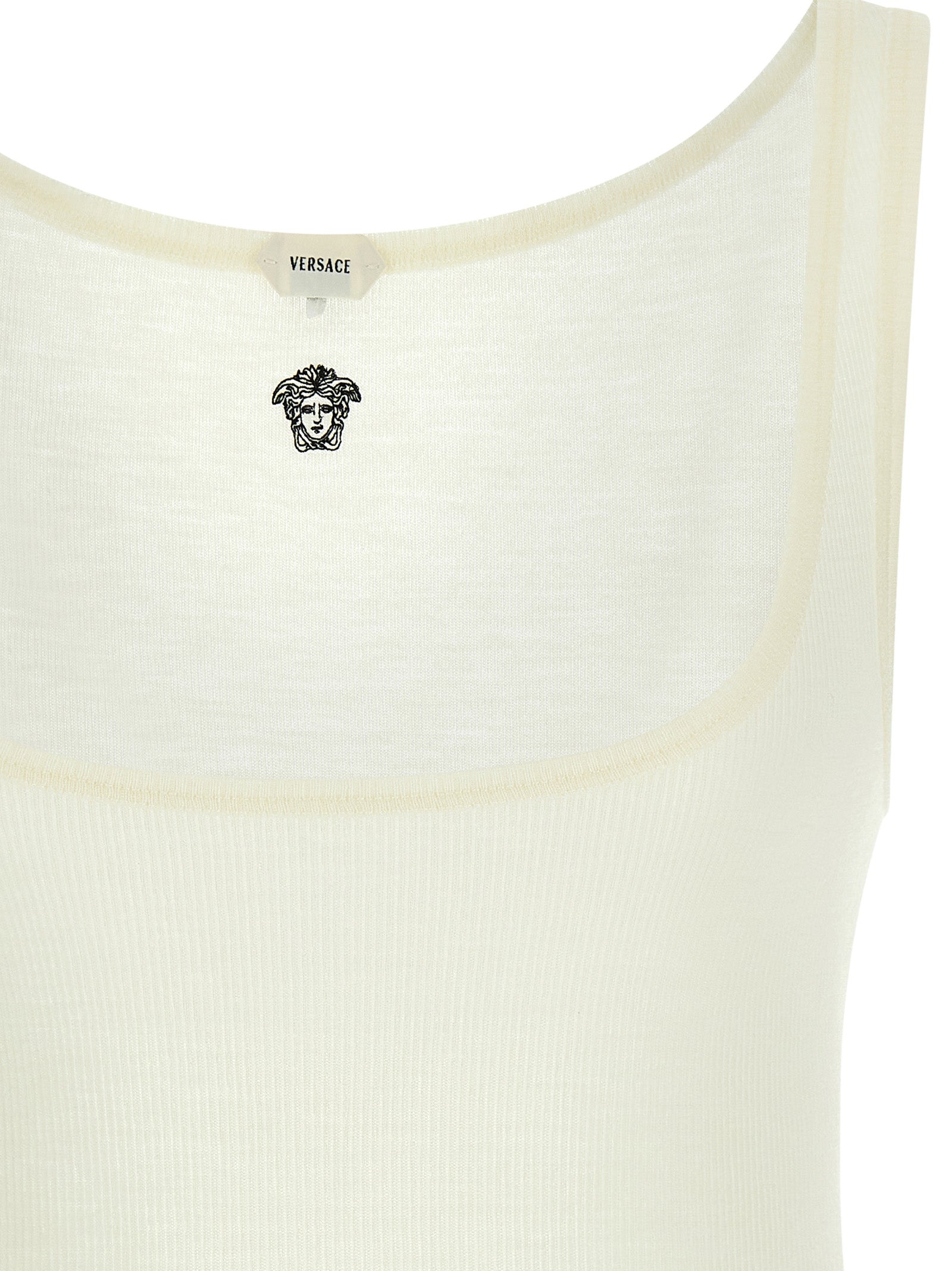 T-shirt sans manches en laine vierge blanche de Versace, élégant et moderne, affichant le logo emblématique de la marque.