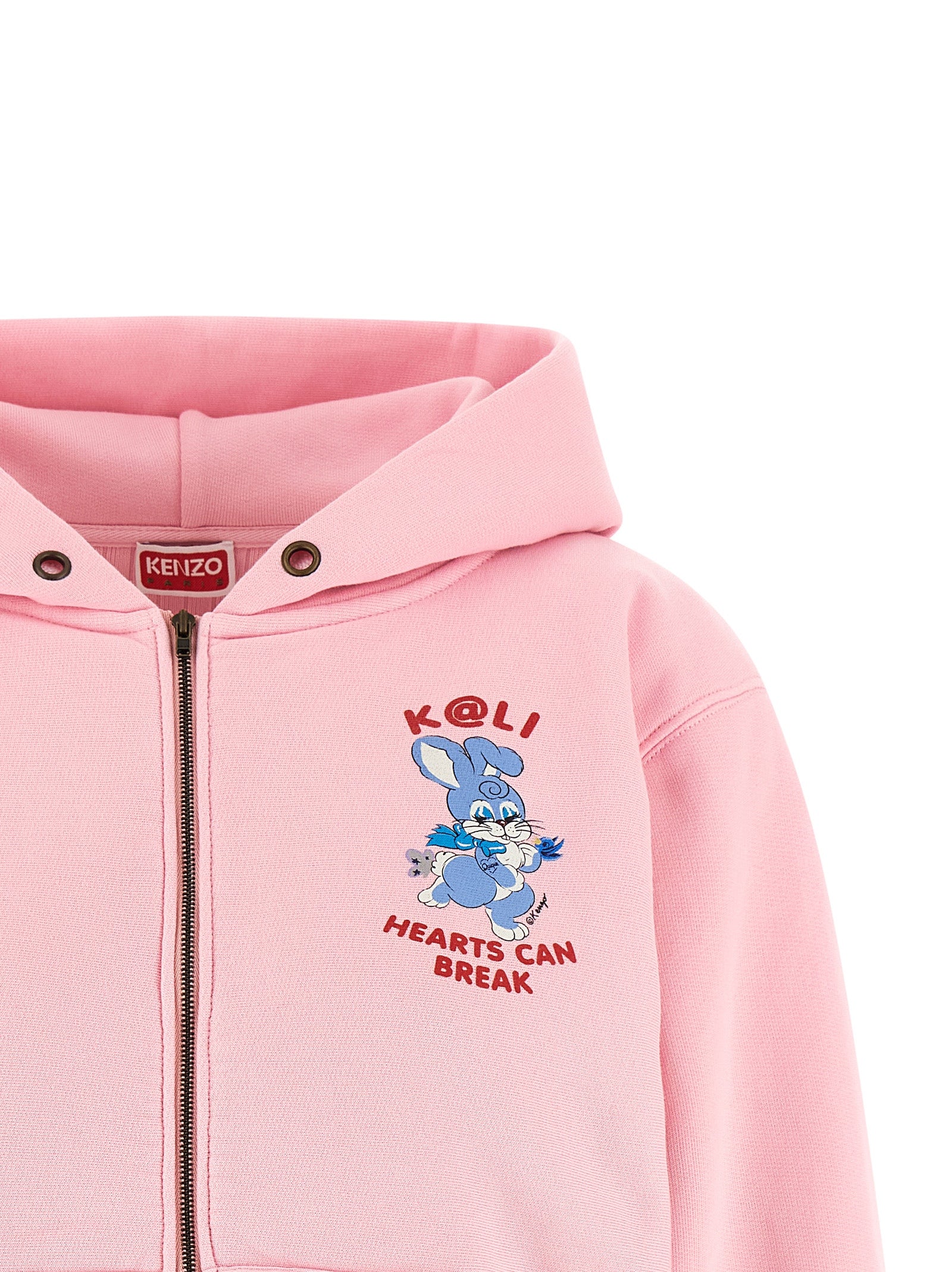 Sweat-shirt multicolore en coton de la marque Kenzo avec motif audacieux et logo visible, porté en style décontracté.