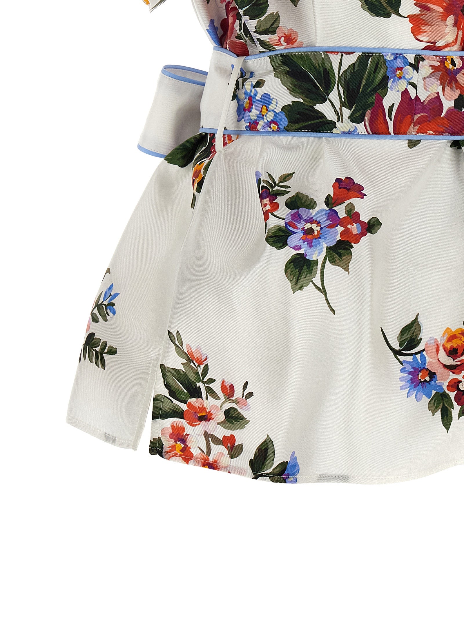 Blouse en soie blanche de Dolce & Gabbana, élégante et fluide, avec détails raffinés et coupe sophistiquée.