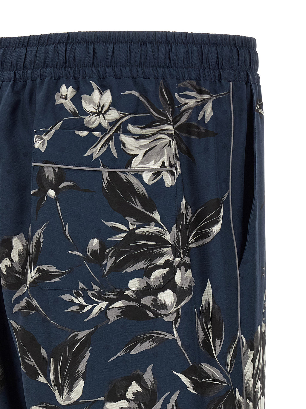 Pantalons décontractés en soie bleue de Dolce & Gabbana, style élégant et confortable pour homme.