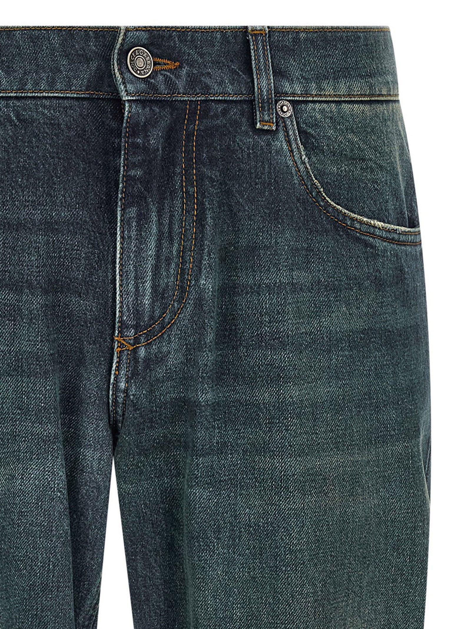 Jeans droits en coton bleu Dolce & Gabbana, style classique, visible avec ceinture et détails de couture.