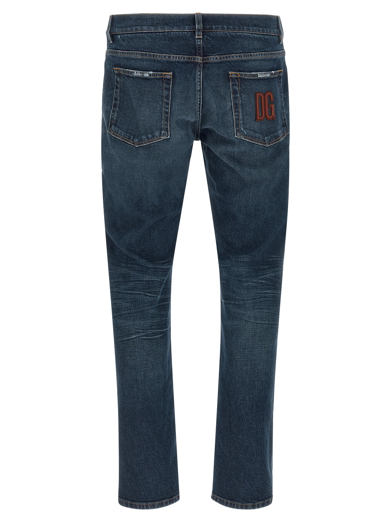 Jeans en denim en coton bleu Dolce & Gabbana, coupe classique, visible détails de couture et fermeture éclair.