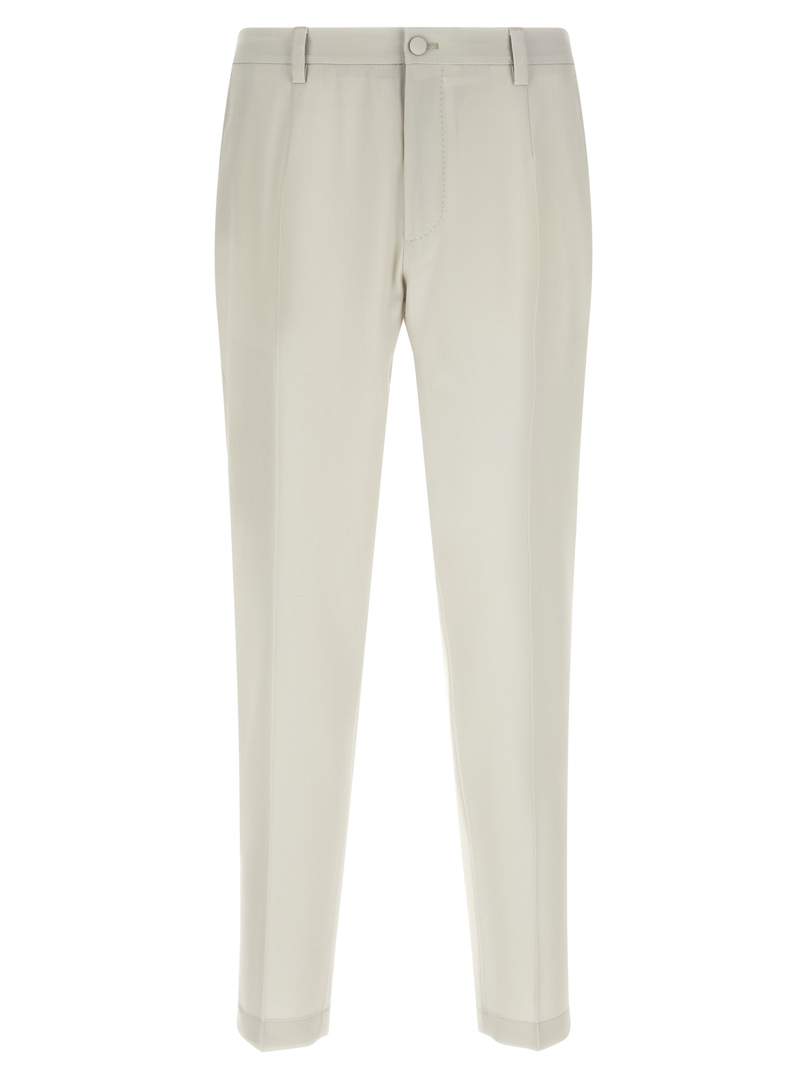 Pantalon beige en laine vierge de Dolce & Gabbana, style élégant et classique pour femme, visible en détail.
