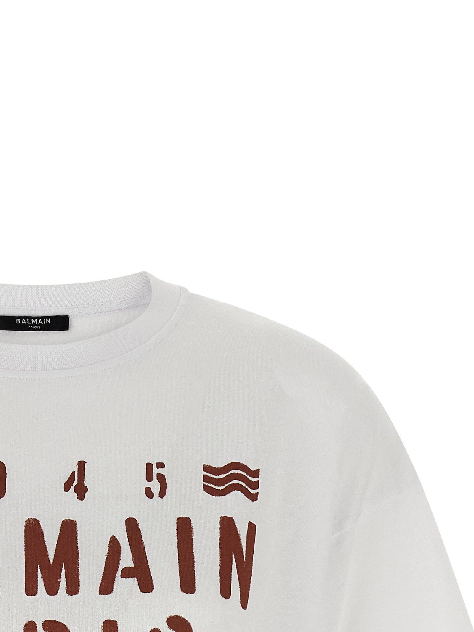 T-shirt blanc en coton de Balmain, coupe classique, portée sur un modèle, vue de face.