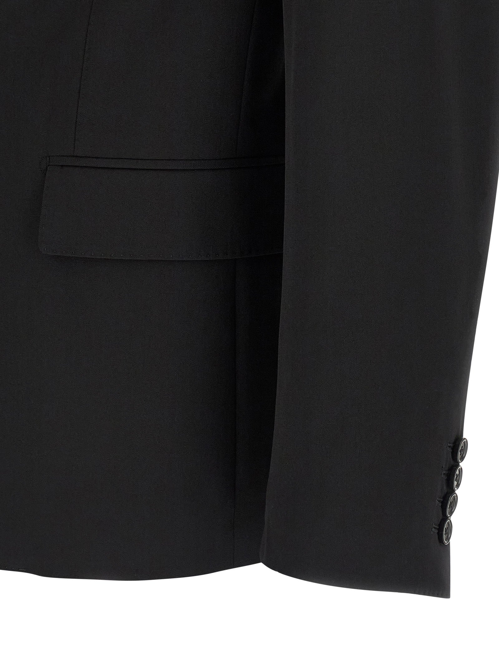 Veste blazer noire en laine vierge de Dolce & Gabbana, coupe élégante et sophistiquée, vue de face sur fond neutre.