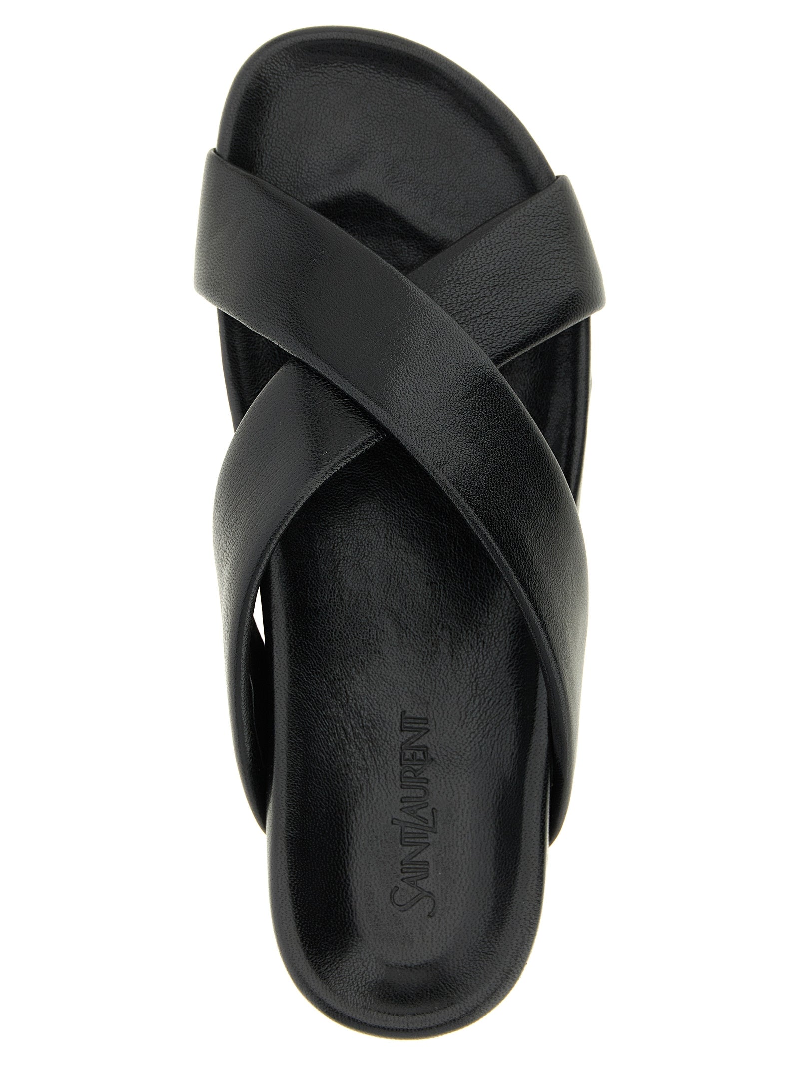 Sandales Saint Laurent en cuir d'agneau noir, élégantes et modernes, avec une finition lisse et une semelle confortable.