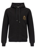 Sweatshirt en coton noir de la marque Dolce & Gabbana, coupe classique avec logo discret sur la poitrine.