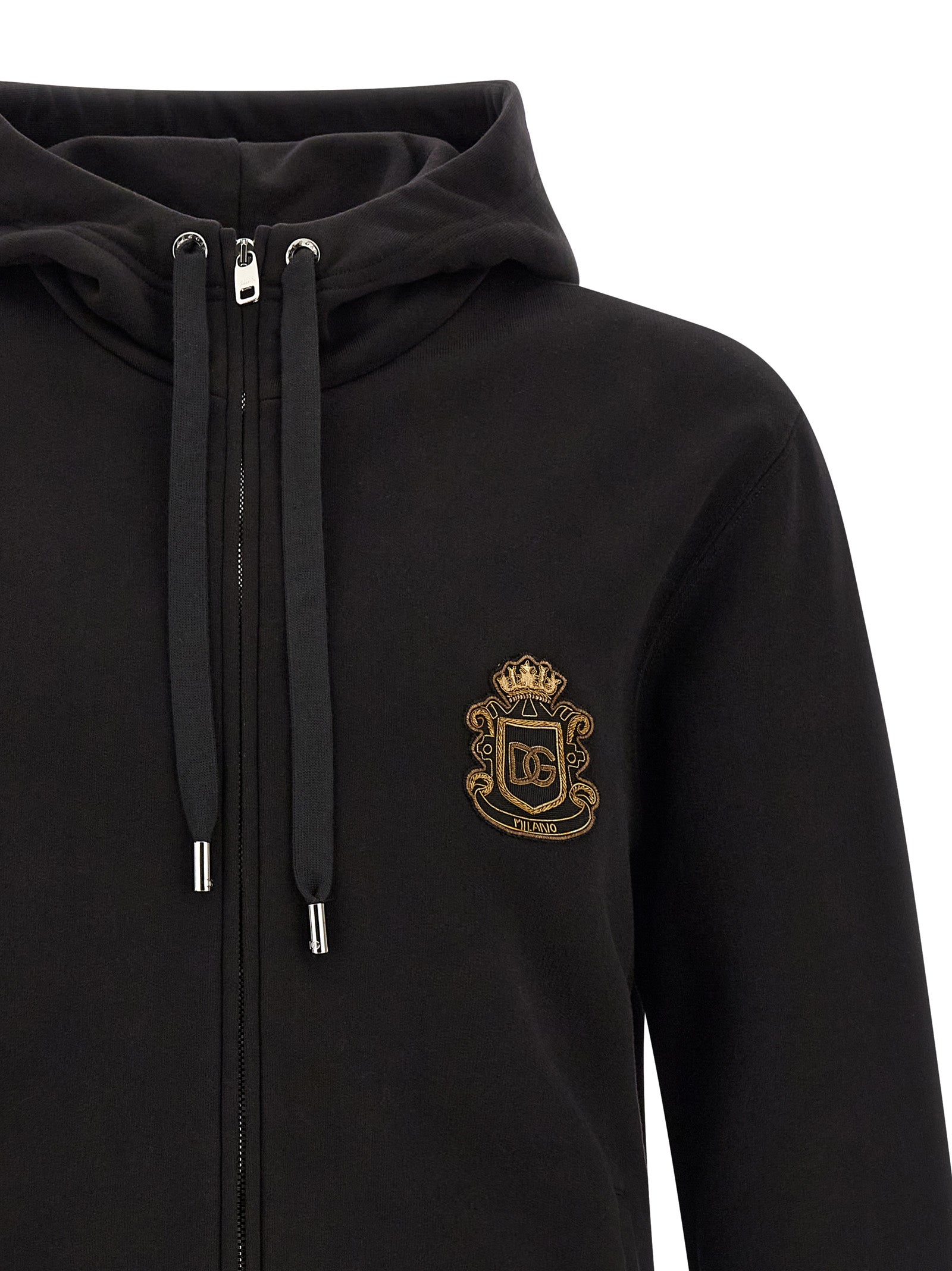 Sweat-shirt en coton noir de Dolce & Gabbana, style décontracté avec logo discret, porté sur un mannequin.