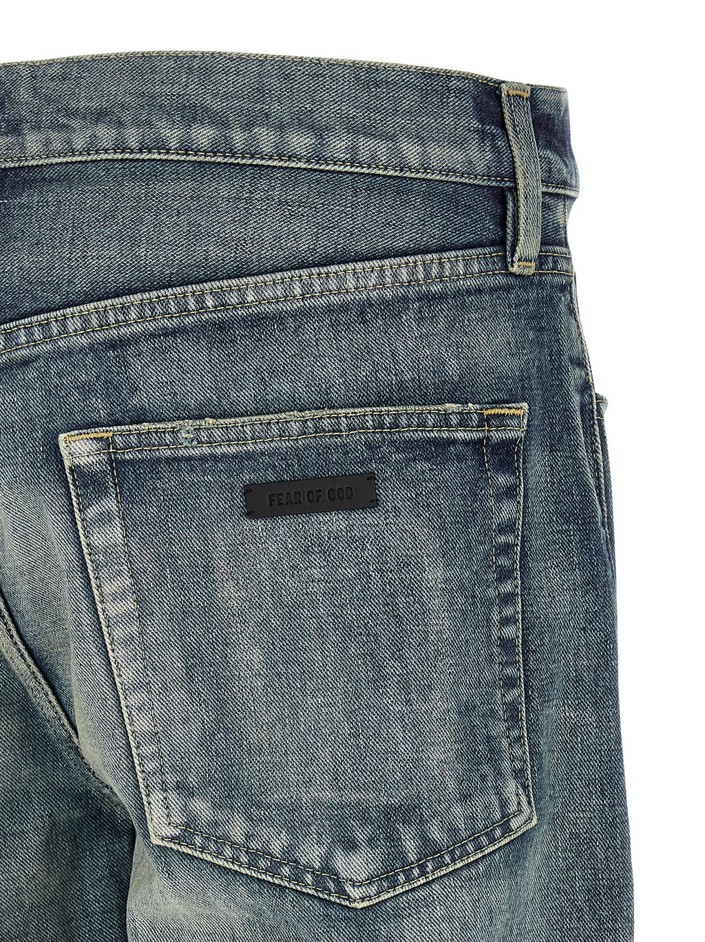 Jeans straight en coton bleu de Fear Of God, style décontracté avec coupe classique et détails simples visibles sur l'image.