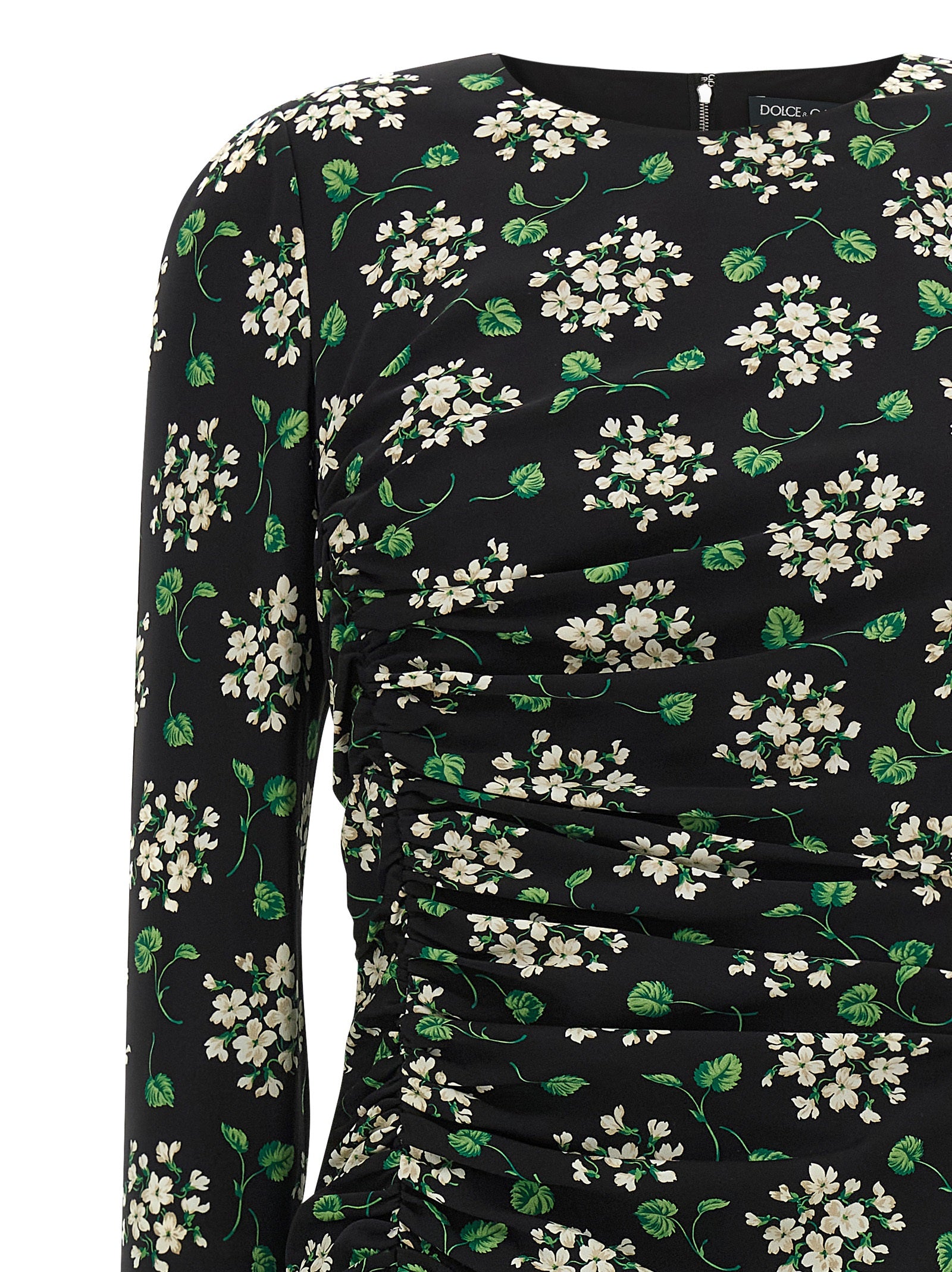 Robe midi synthétique noire de Dolce & Gabbana, élégante et sophistiquée, portée avec détails en tissu noir.