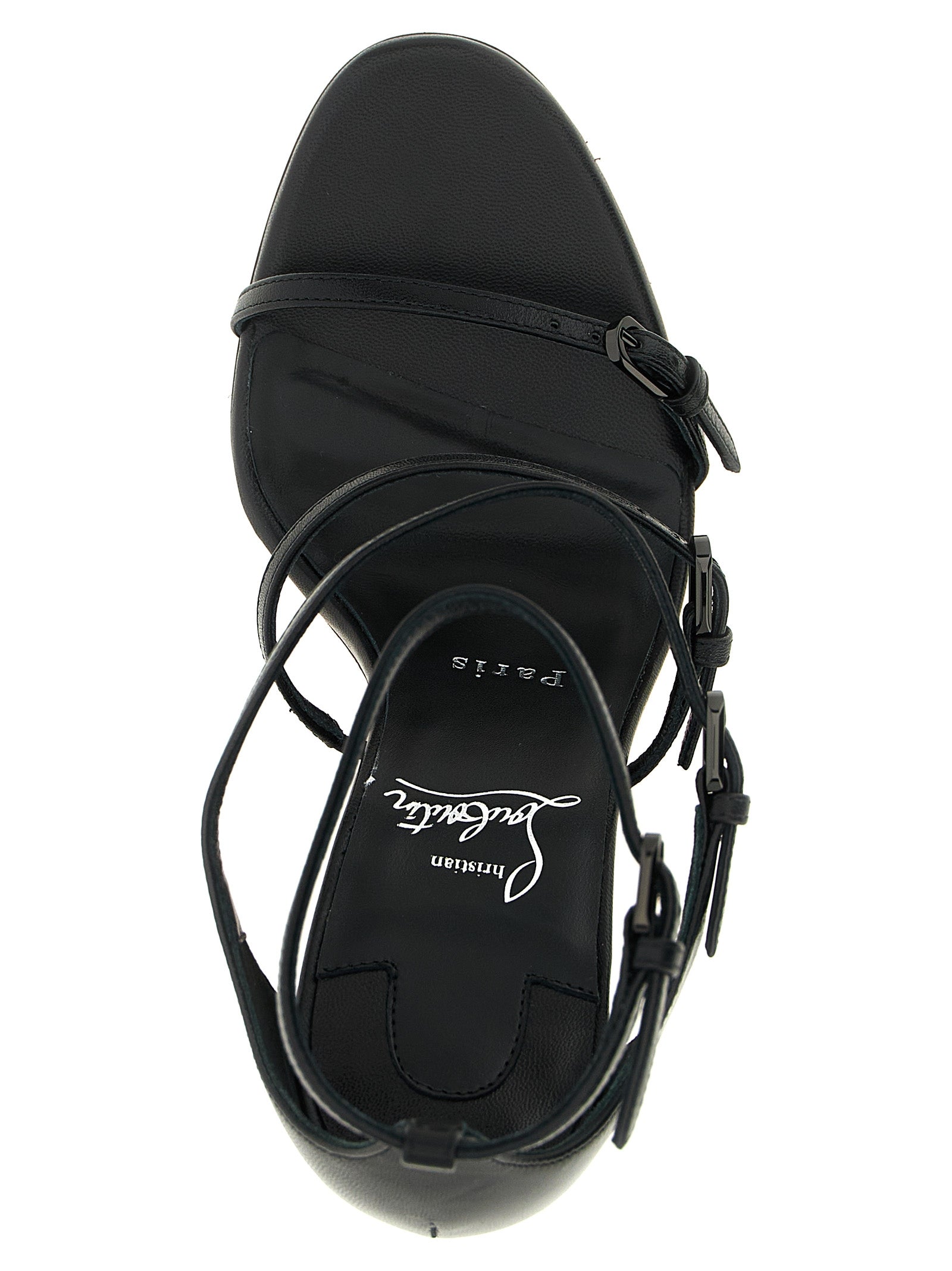 Sandales à talons aiguilles Christian Louboutin en cuir de chèvre noir, avec semelle signature rouge et design élégant.