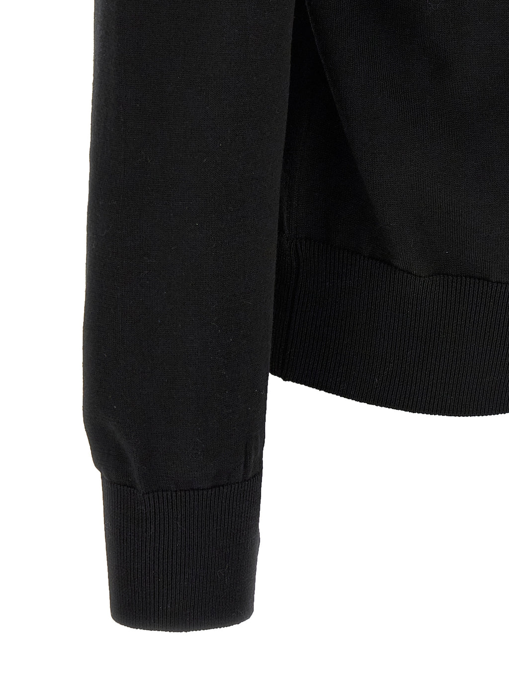 Cardigan en laine vierge noire Dolce & Gabbana, doux et élégant, porté sur un mannequin.
