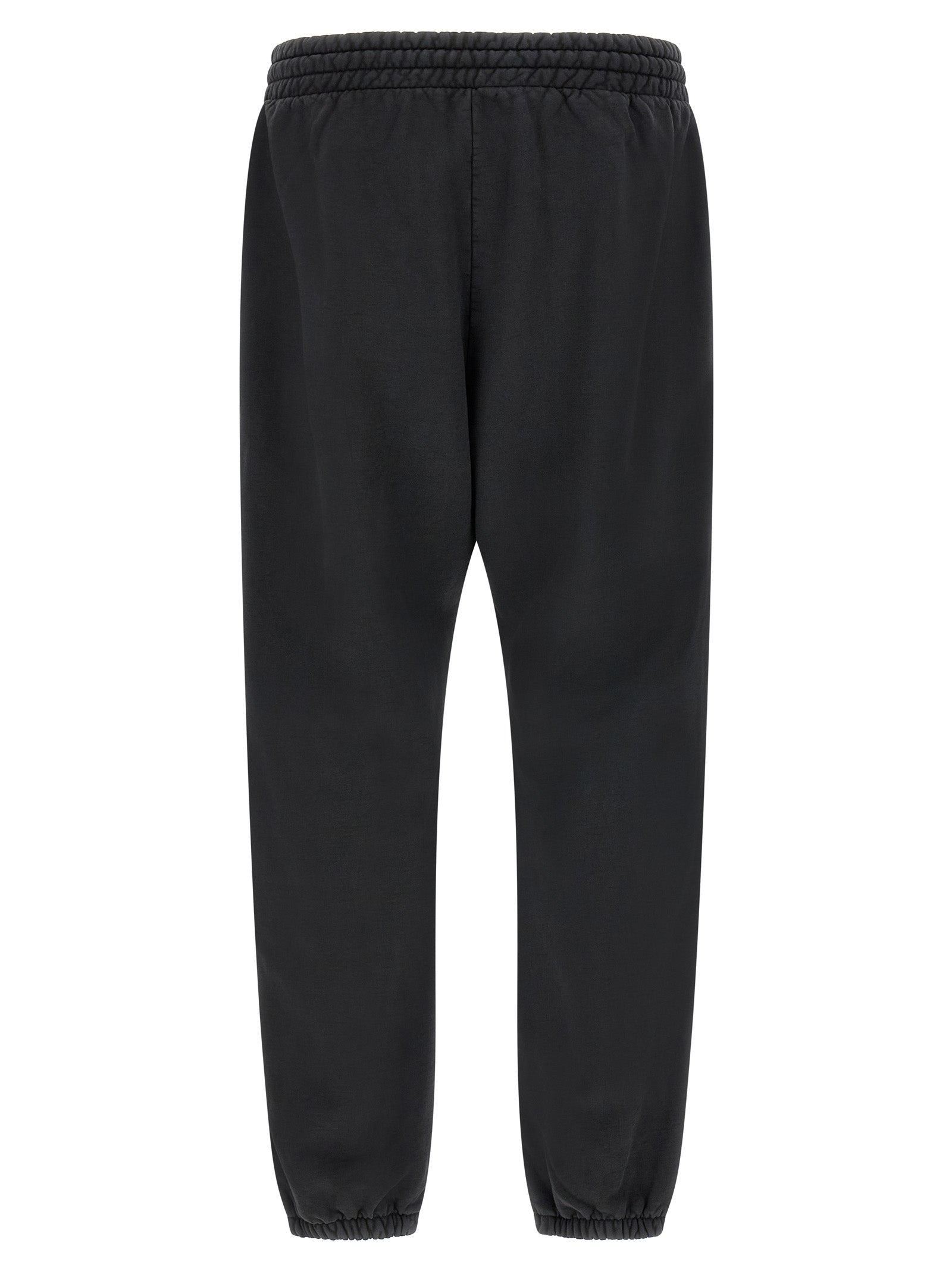Pantalons de jogging en coton noir Fear Of God, style décontracté, avec ceinture élastique et poches latérales visibles.