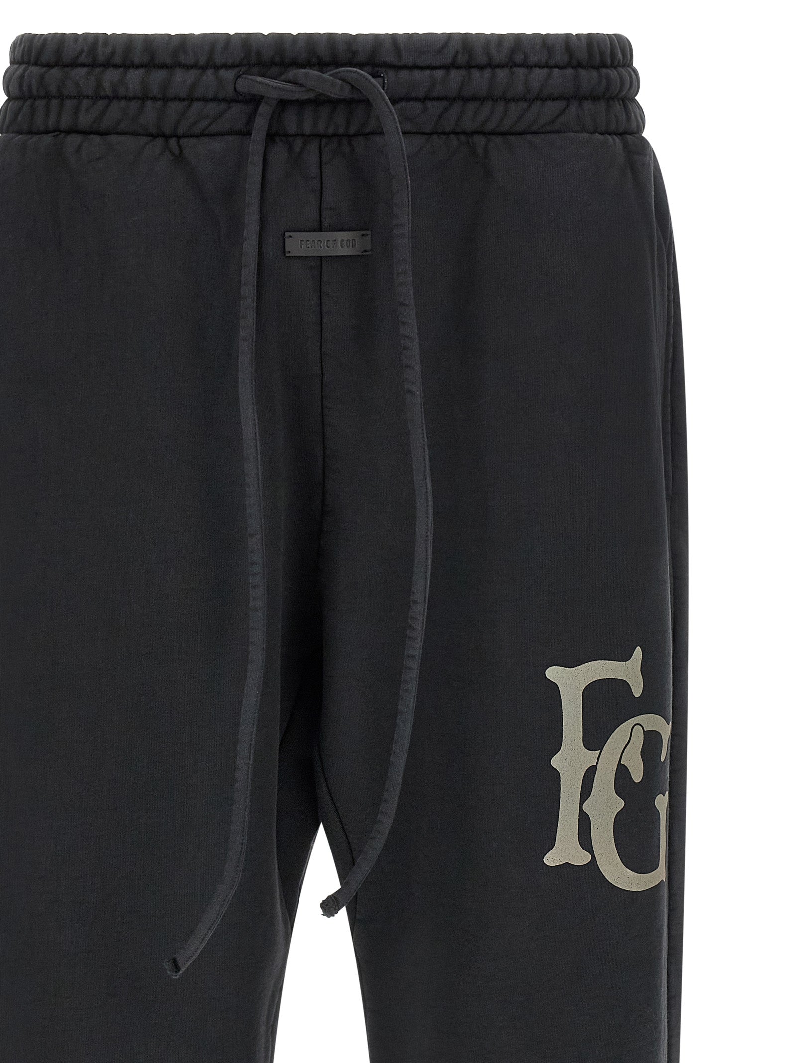 Pantalons de jogging en coton noir Fear Of God, style décontracté pour l’entraînement ou la détente, avec logo discret.