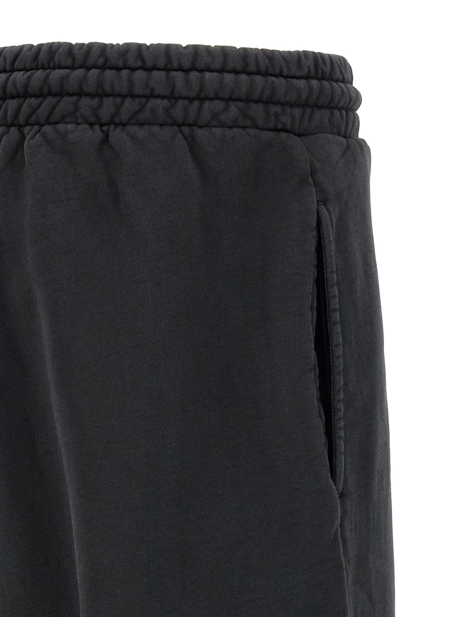 Pantalons de jogging en coton noir Fear Of God pour homme, coupe décontractée et confortable pour l'entraînement ou le quotidien.