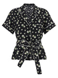 Chemise en soie noire Dolce & Gabbana avec col classique et manches longues, élégante et raffinée.