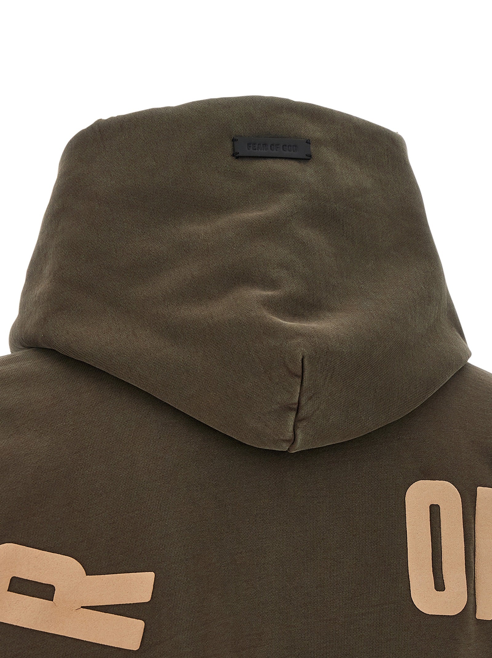 Sweatshirt en coton marron de Fear Of God, style décontracté, avec logo discret, porté sur un mannequin.