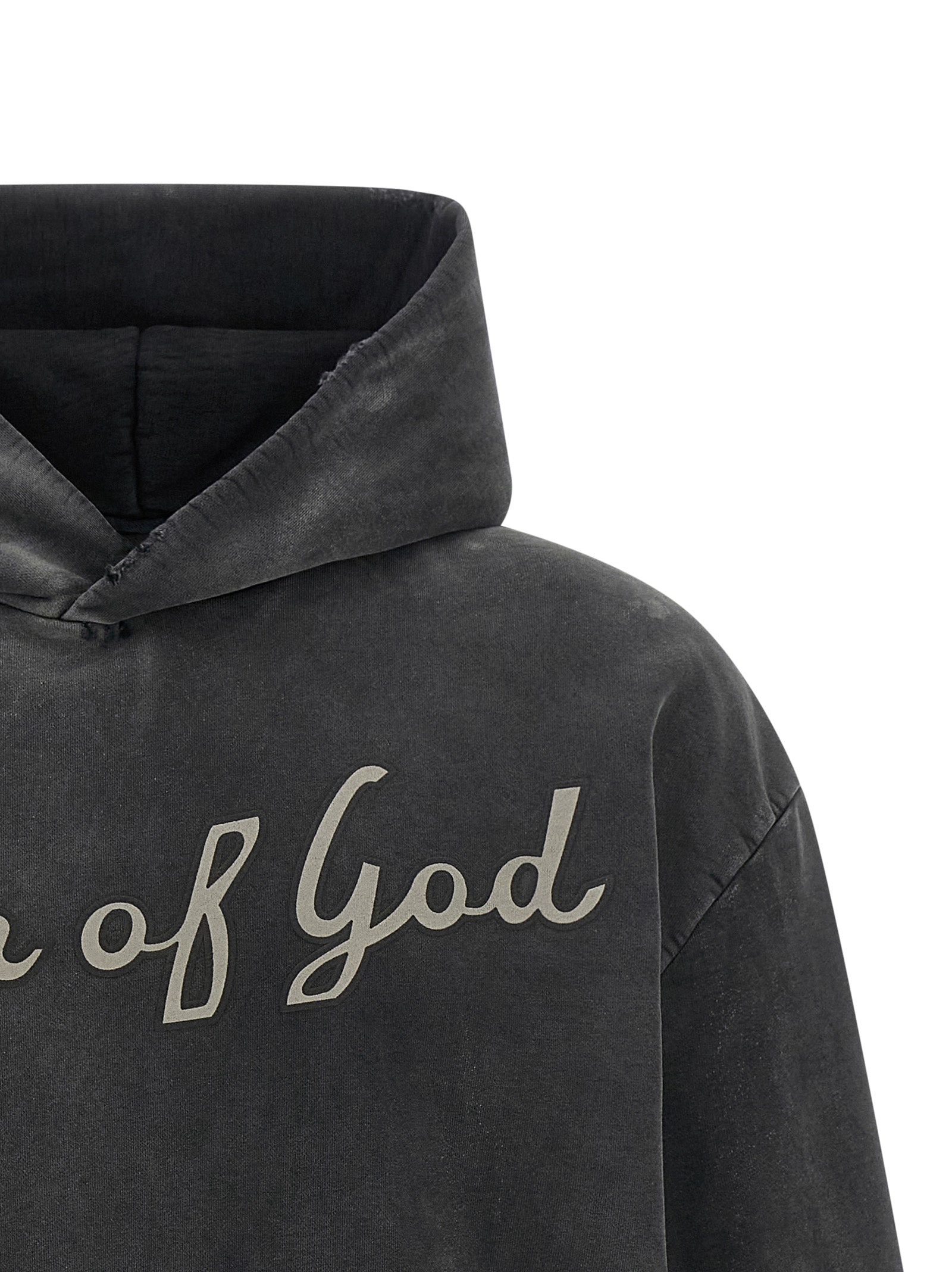 Sweatshirt en coton noir de Fear Of God, coupe décontractée, logo discret, porté sur un mannequin blanc.