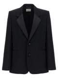 Veste blazer en laine noire de Saint Laurent, élégante et moderne, portée sur un mannequin.