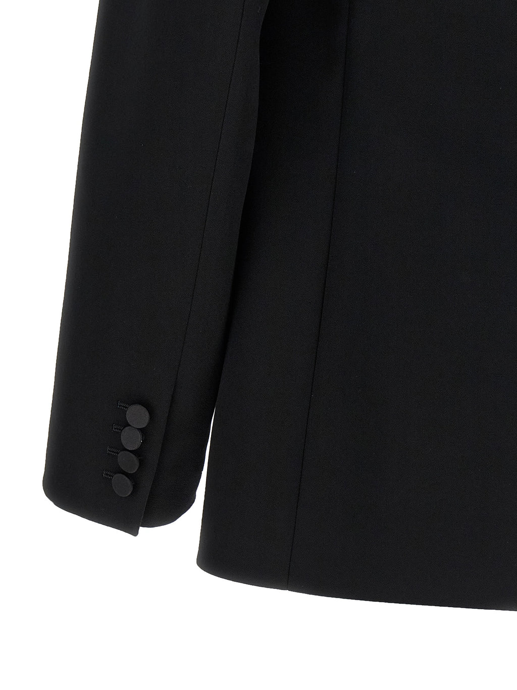 Veste blazer en laine noire de Saint Laurent, élégante et ajustée, portée sur un mannequin dans une ambiance sophistiquée.
