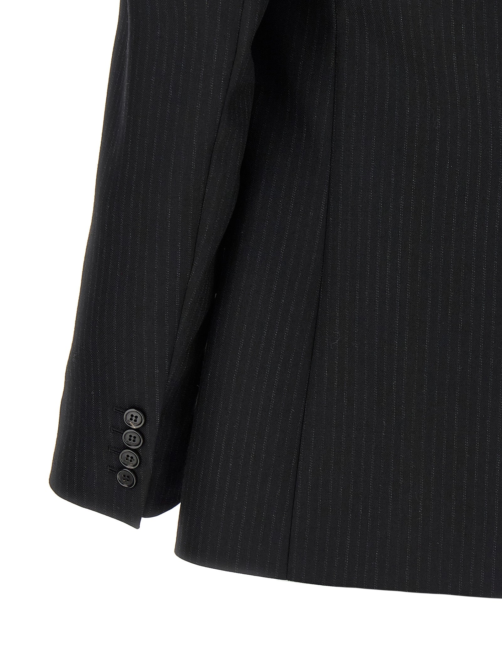 Blazer en laine noire Saint Laurent pour homme, coupe classique avec col et boutons élégants, porté sur un mannequin.