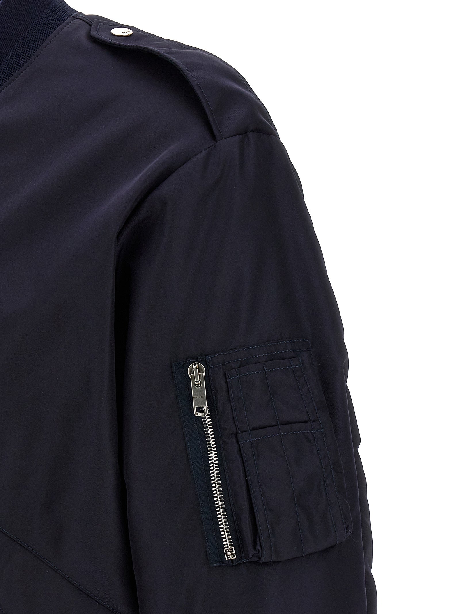 Veste bomber Givenchy en polyamide bleue, avec fermeture éclair et détails modernes, vue de face.