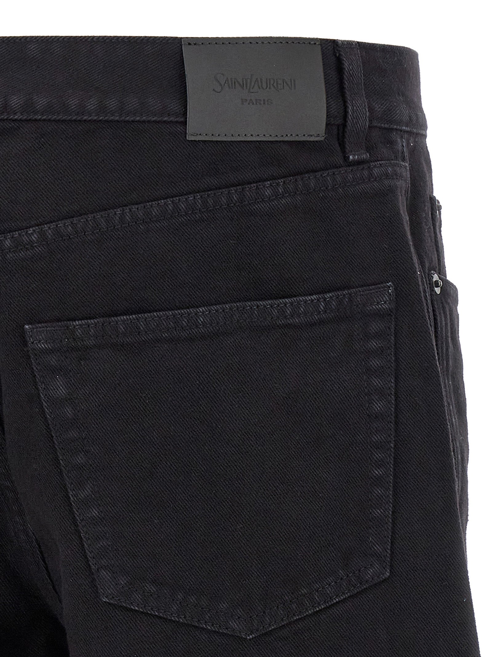 Jeans droits en coton noir Saint Laurent, coupe droite, détails élégants, vue de face sur le produit.