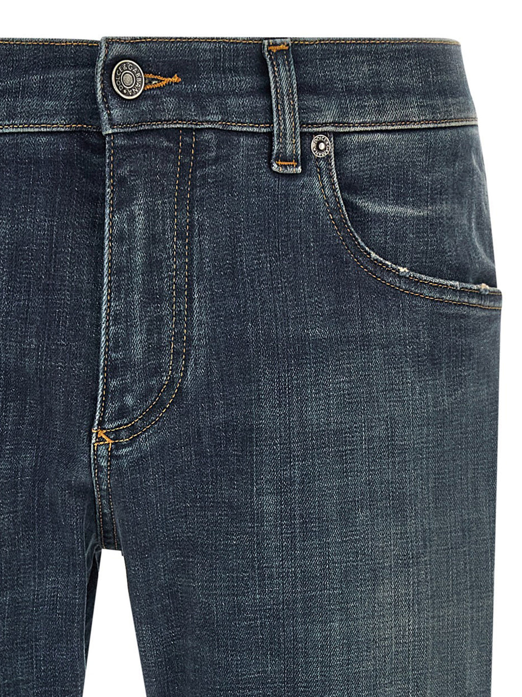 Jeans droits en coton bleu Dolce & Gabbana, style classique, visibles en détail dans l'image.