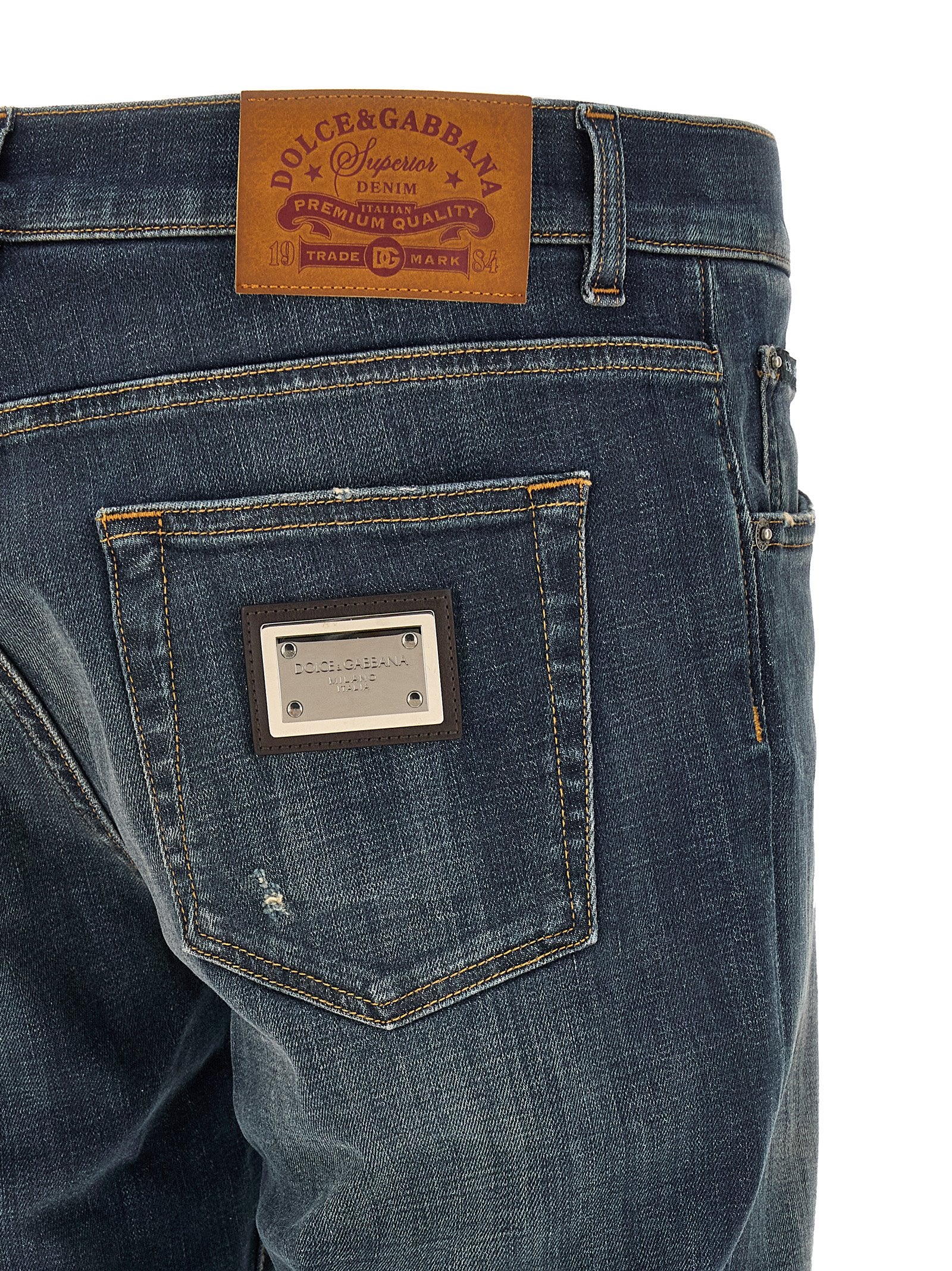 Jeans droits en coton bleu Dolce & Gabbana, style classique et coupe droite, visible avec détails de couture.