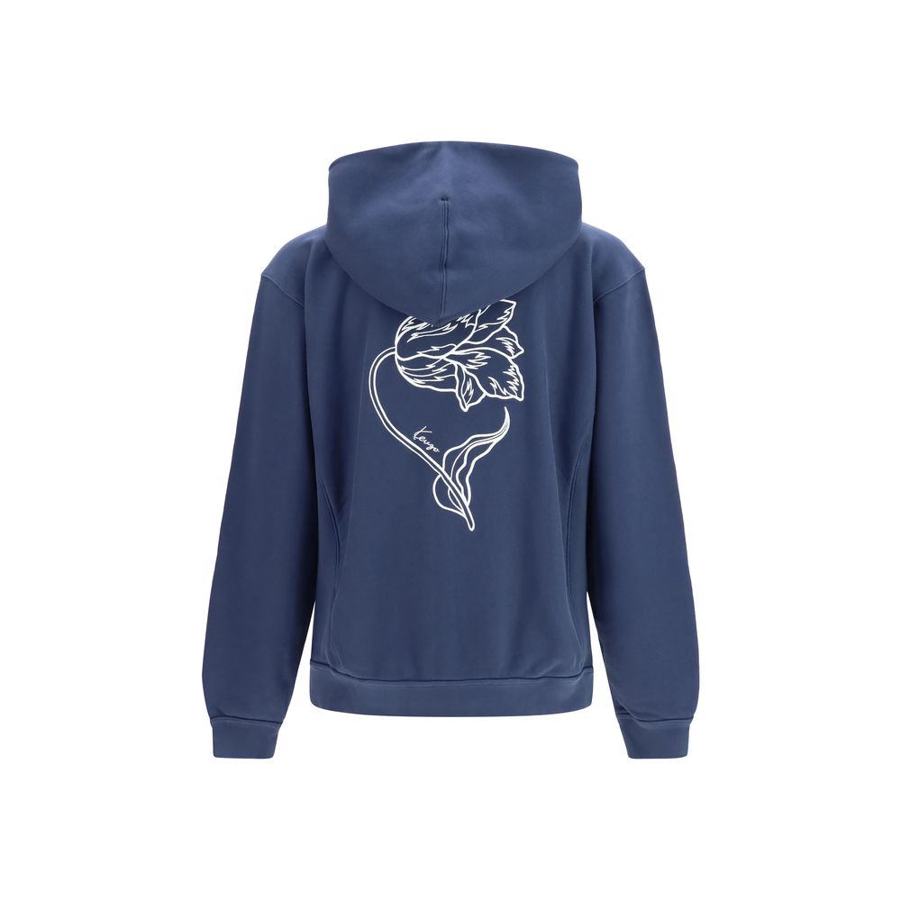 Sweatshirt en coton bleu de la marque Kenzo, avec logo visible, porté dans une ambiance décontractée.
