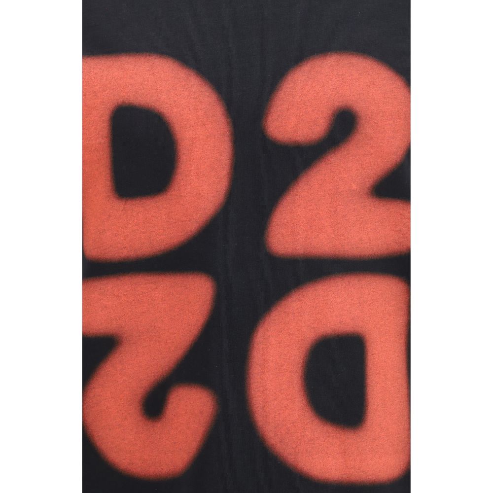 T-shirt en coton noir Dsquared² avec logo graphique, porté sur un mannequin, à manches courtes et coupe classique.