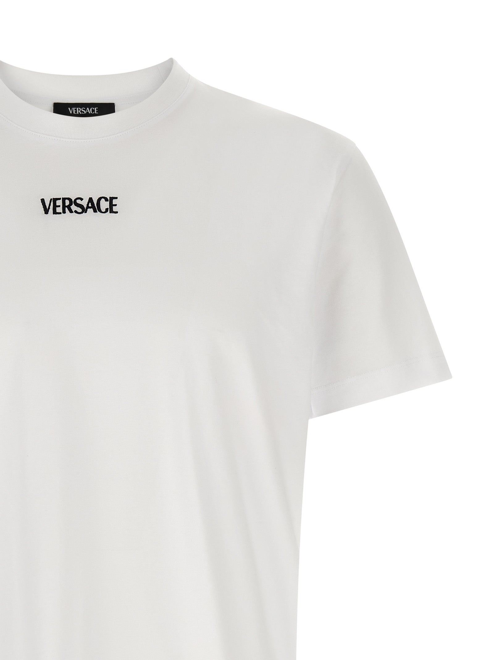 T-shirt blanc en coton de la marque Versace, coupe classique et logo visible sur le devant.