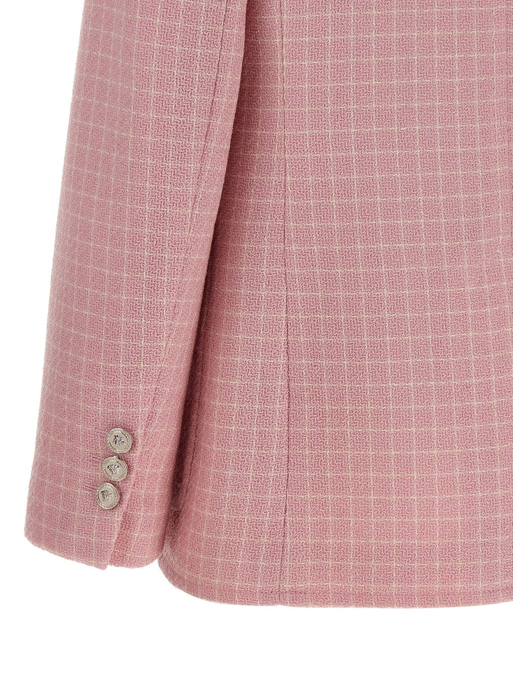 Blazer en laine vierge multicolore de Versace, coupe élégante avec motif distinctif, porté sur un mannequin.