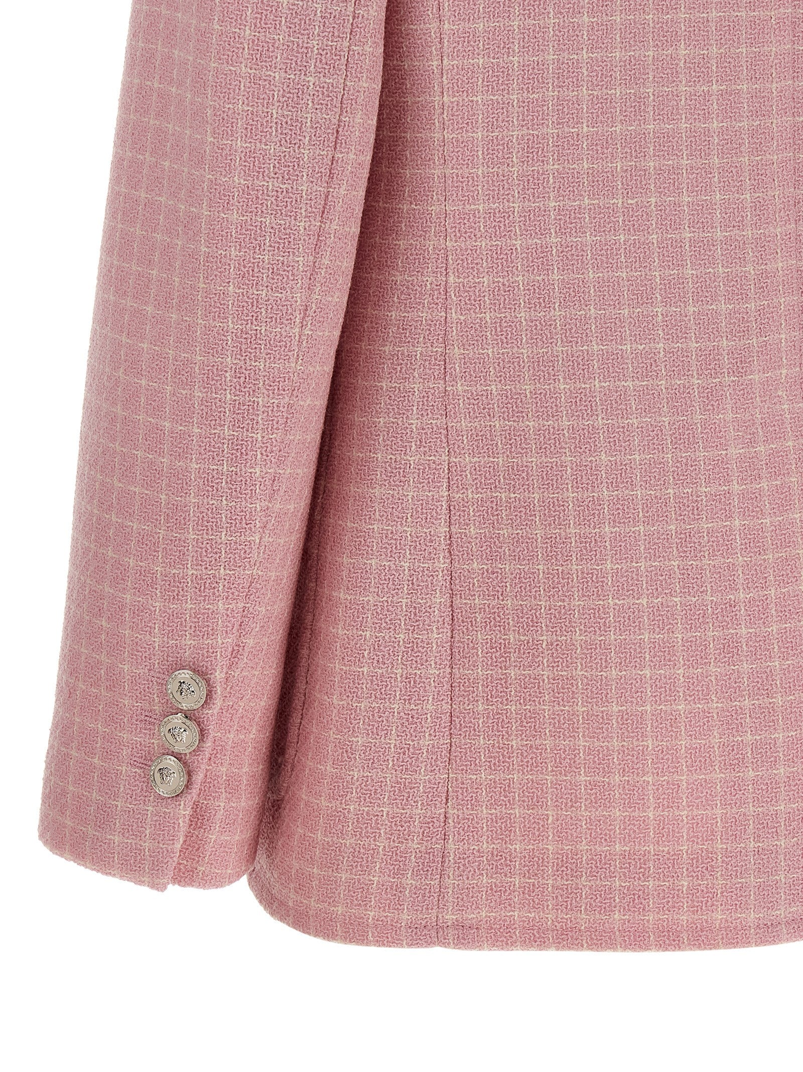 Blazer en laine vierge multicolore de Versace, coupe élégante avec motif distinctif, porté sur un mannequin.