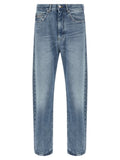 Jeans straight-leg en coton bleu de la marque Versace, coupe classique et détails élégants visibles sur l'image.