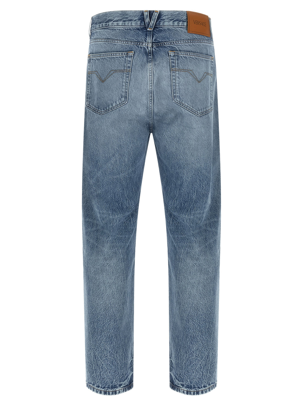 Jeans droits en coton bleu de la marque Versace, visible avec détails de coupe et couture.