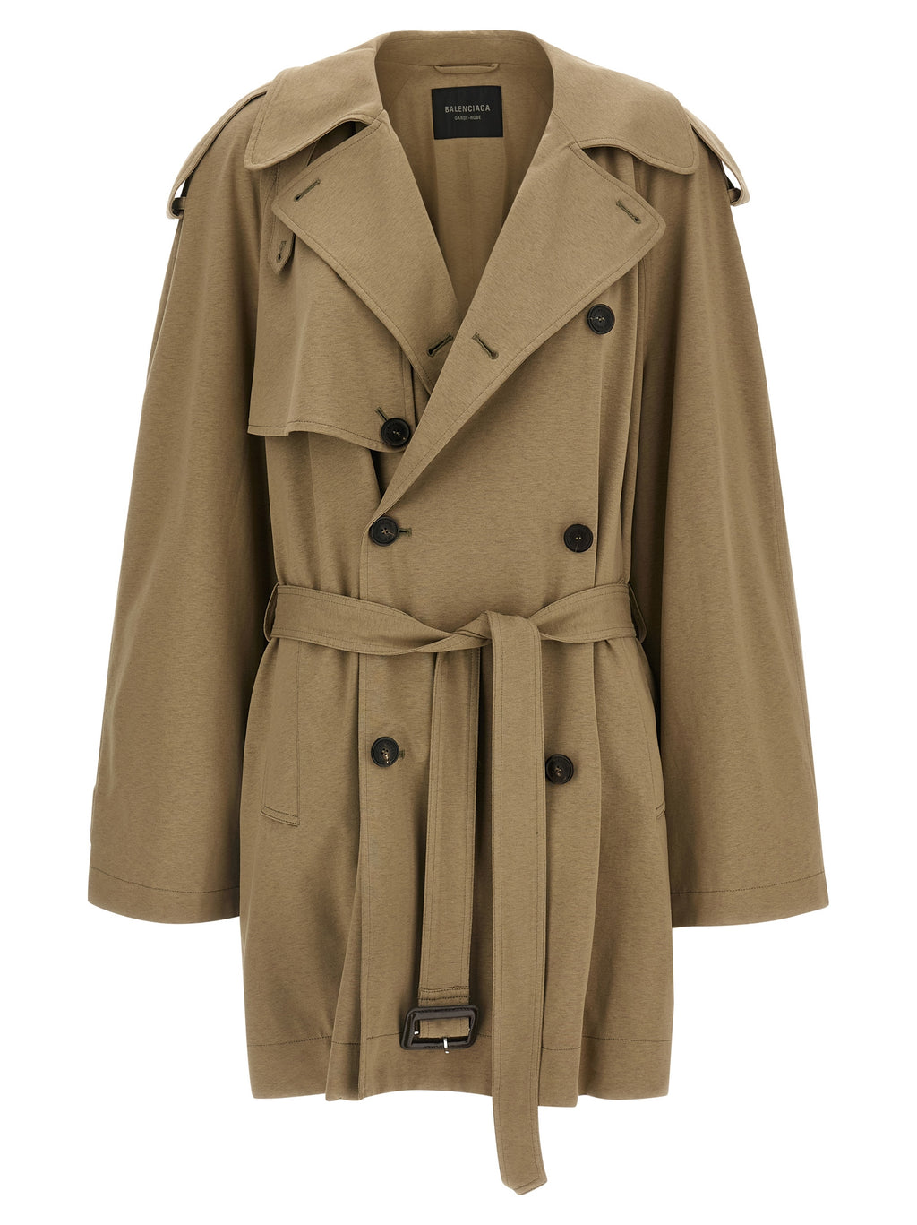 Manteau en coton beige de Balenciaga porté sur un mannequin, mettant en valeur le style élégant et la coupe moderne.