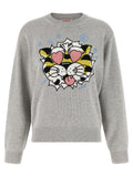 Cardigan en laine gris de la marque Kenzo, doux et élégant, porté sur un mannequin avec détails de texture visible.