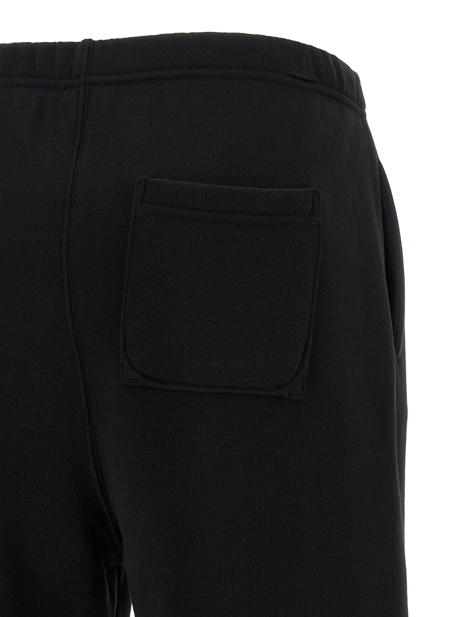 Pantalon de jogging en coton noir Kenzo pour homme, look décontracté et confortable, parfait pour le sport ou la détente.