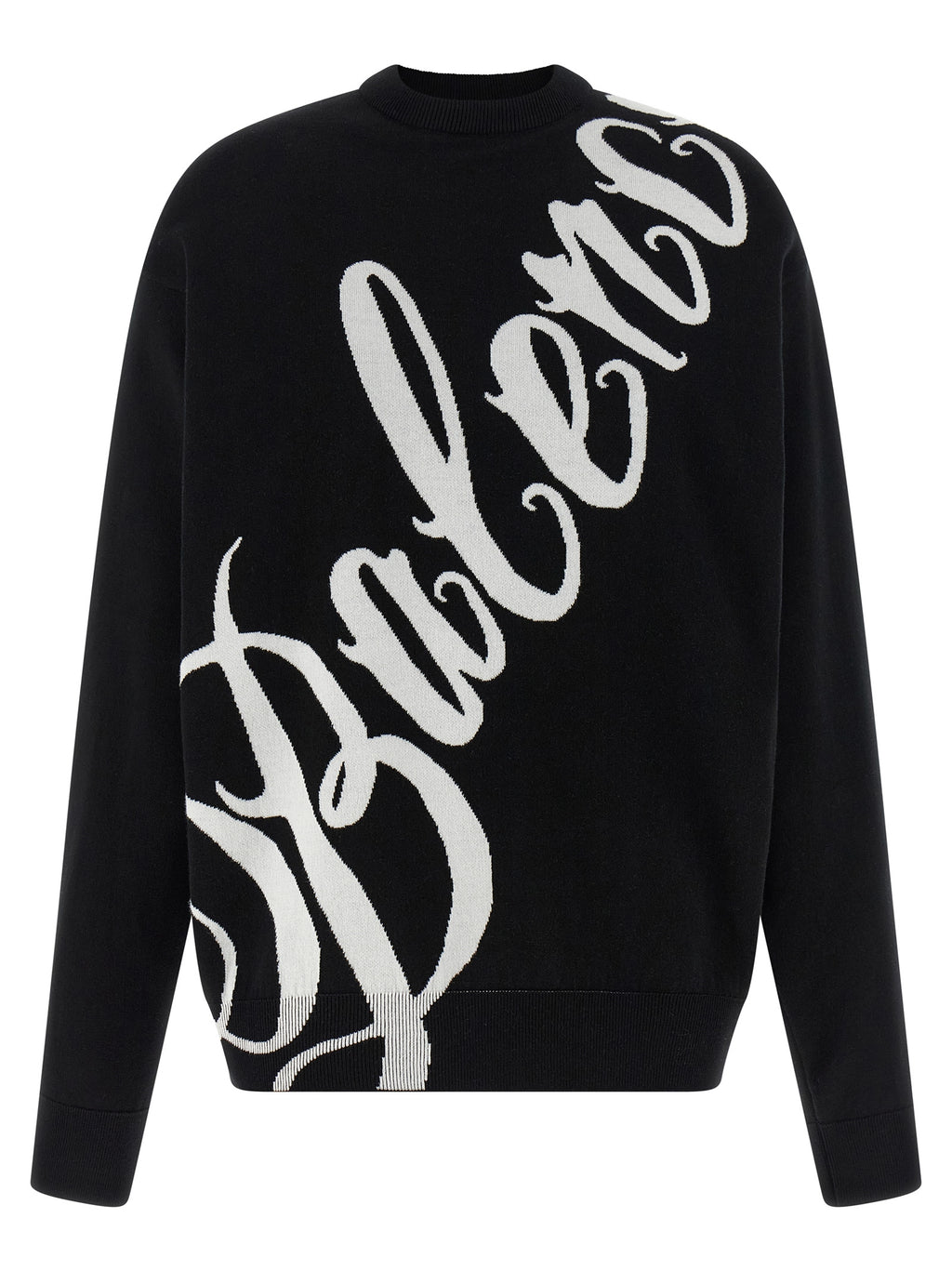 Pull en coton bicolore Balenciaga avec boutons, porté en mode décontracté, couleur neutre, détails modernes.