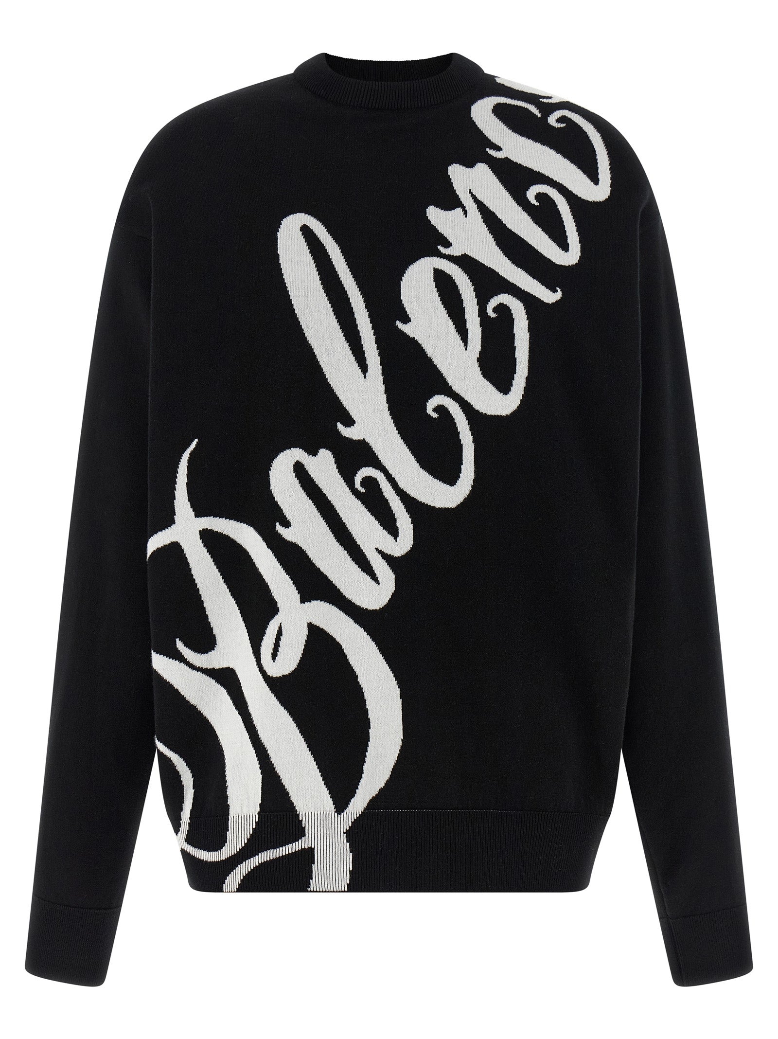 Pull en coton bicolore Balenciaga avec boutons, porté en mode décontracté, couleur neutre, détails modernes.